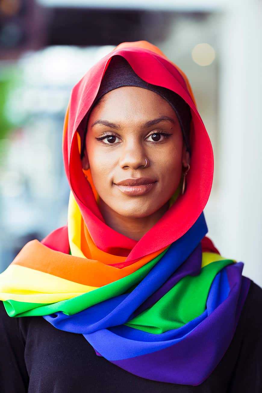 Model and writer Kalida Edwards wears the Pride scarf by MOGA