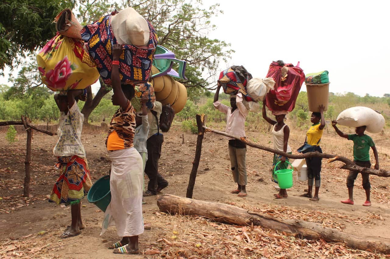 A group of new arrivals, mainly women and children, arrive in southern Chad escaping violence in the north-west of Central African Republic (CAR).