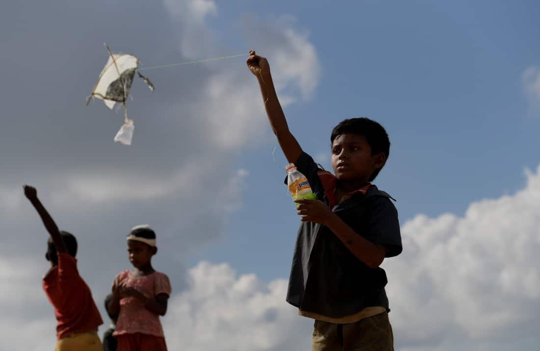 Rohingya children fly handmade kites at the Balukhali refugee camp near Cox's Bazar in Bangladesh on Tuesday, December 12, 2017.