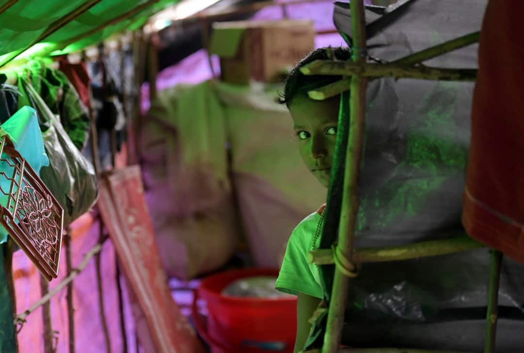 A Rohingya child in her shack which she shares with two families at the Balukhali refugee camp near Cox's Bazar in Bangladesh on Monday, December 11, 2017.