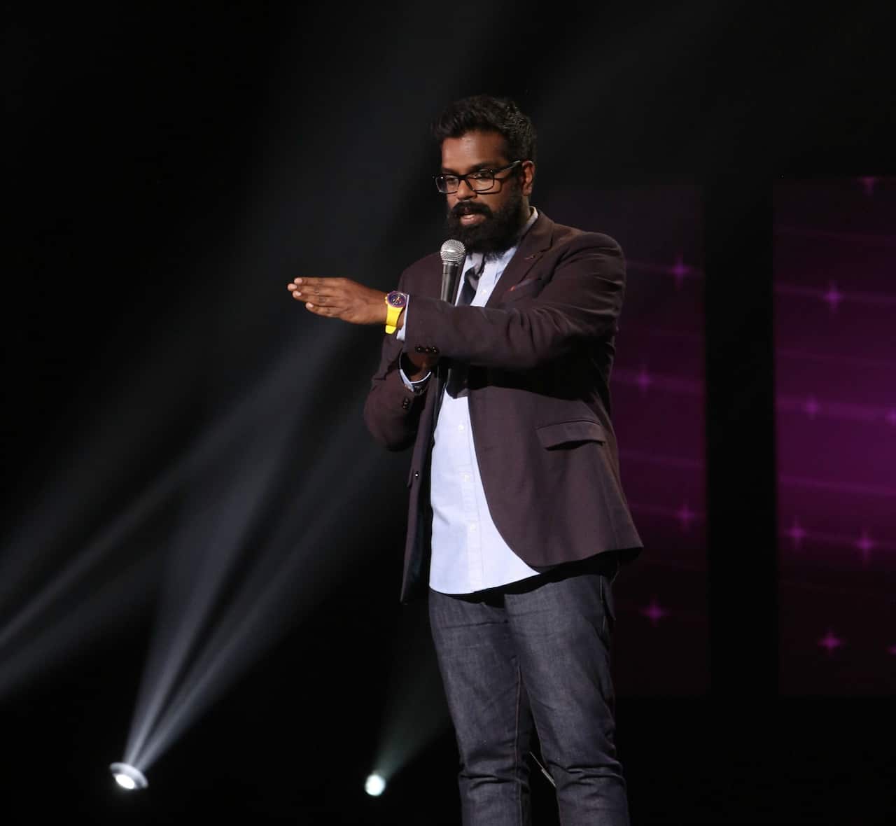 Romesh Ranganathan on stage