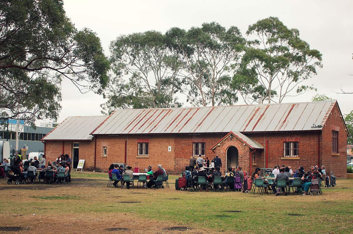 People gathering in a church yard in Liverpool, Sydney