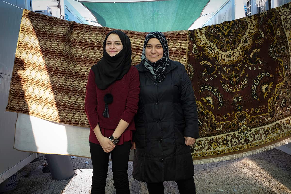 Eman and her daughter Wajd fled Syria with Wajd's younger brothers Zakaria and Mohamad. Wajd hopes to finish school one day and become a chemist.