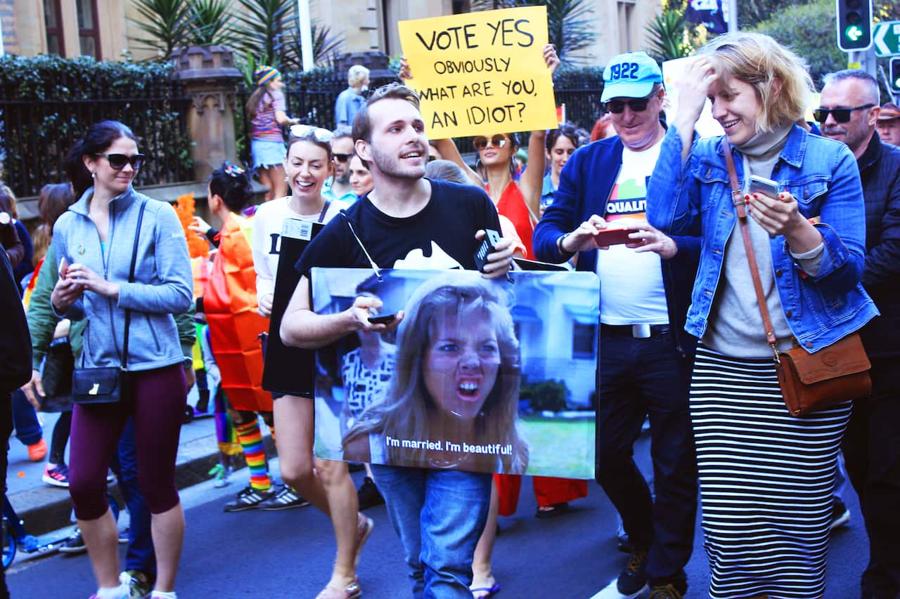'I'm married, I'm beautiful' sign at Sydney Marriage Equality rally on September 10th, 2017. (Photo: Chloe Sargeant / SBS)