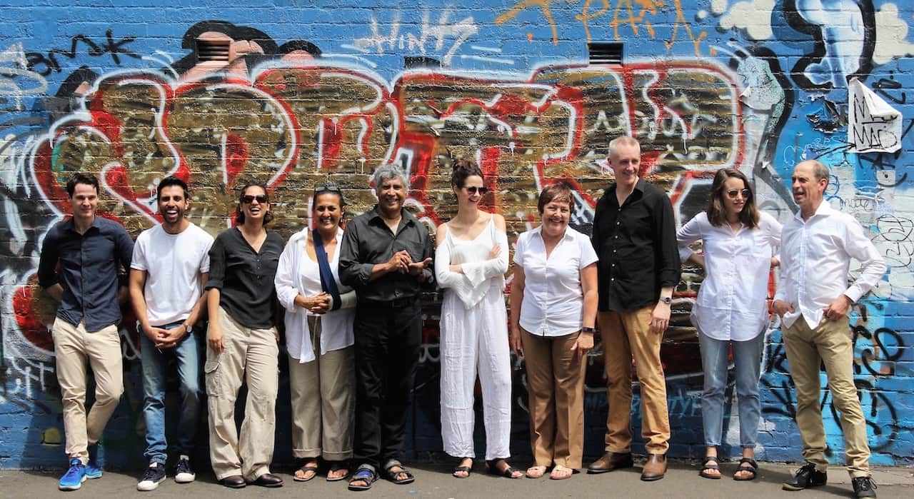 The cast of The Laden Table