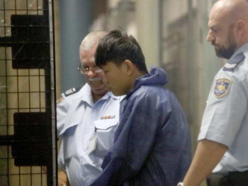 Shuo Dong led to a prison van (file image)