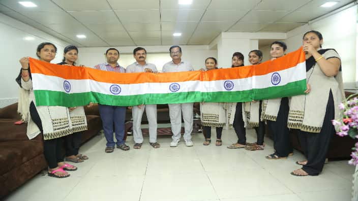 Team of the campaign with the Indian national flag