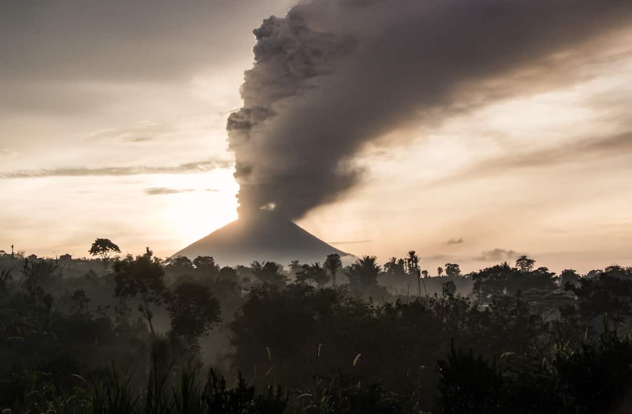 Clouds of ash spew from Mount Agung, an active volcano in Bali, Indonesia which began erupting last week, on November 28, 2017.