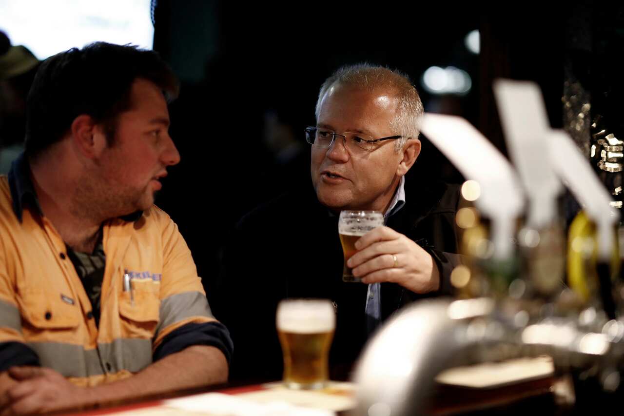 Prime Minister Scott Morrison meets locals at Molly Malone's Irish Pub in Devonport, Tasmania, Wednesday, April 17, 2019. (AAP Image/GETTY IMAGES/POOL/Ryan Pierse)