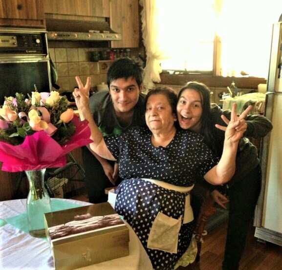 Mrs Maria Vasilakis with members of her family. 