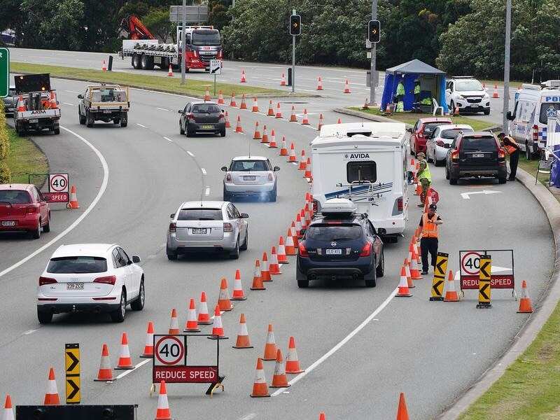 Motorists are stopped at a checkpoint at Coolangatta