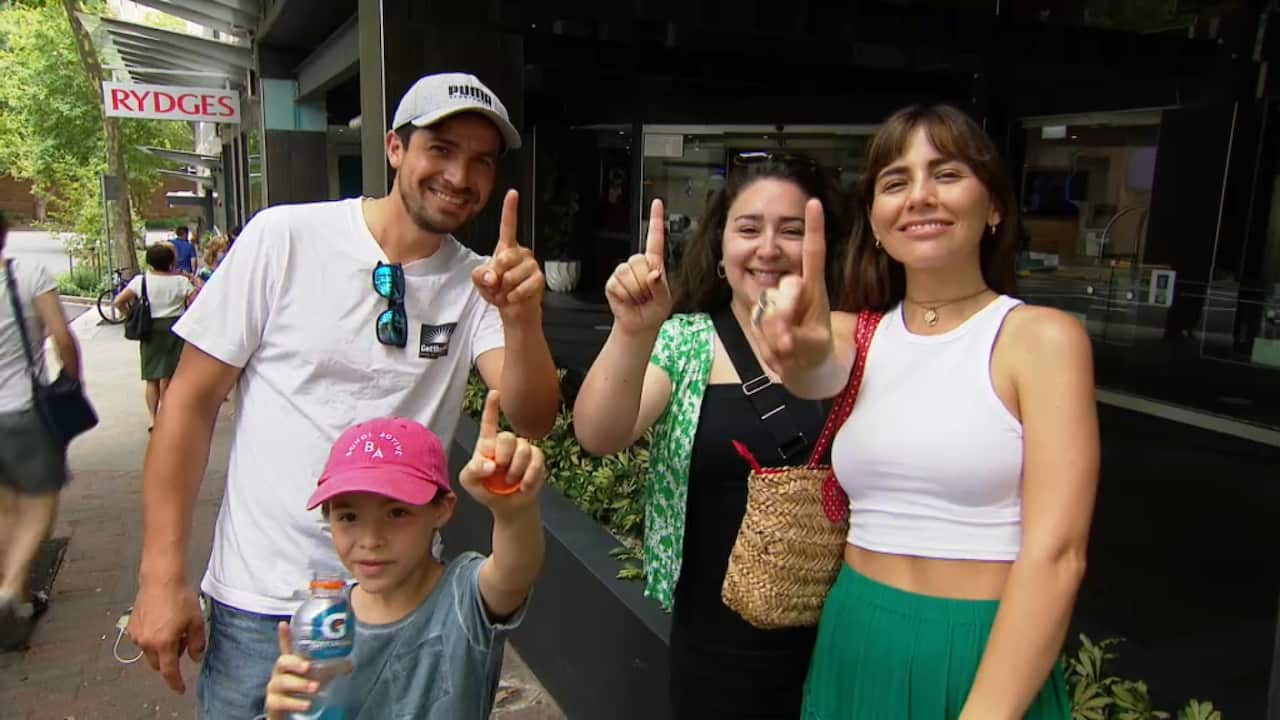 From left to right: Pedro Leon, Victoria Rabia and Carina Torrieta turned up to vote in Sydney on Sunday.