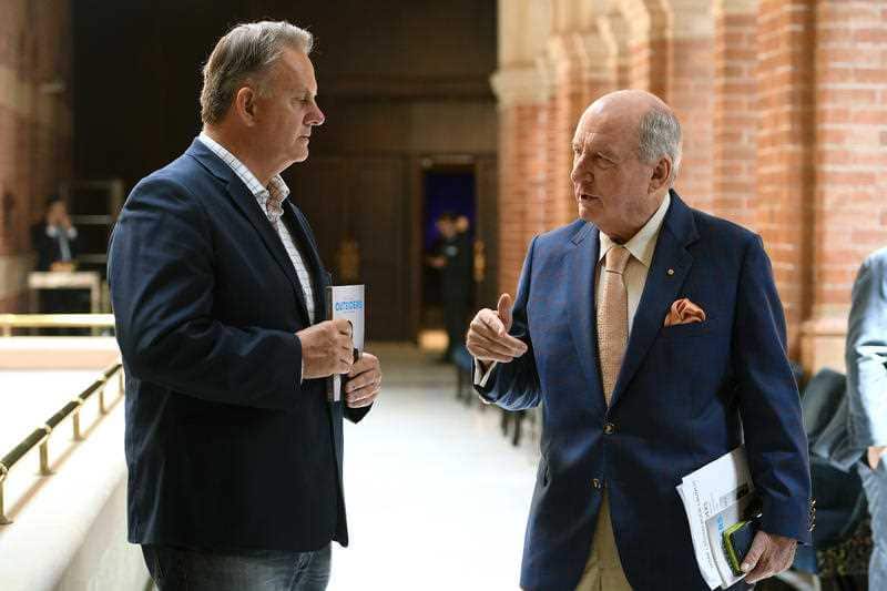Former Labor leader Mark Latham speaks with broadcaster Alan Jones, (right) ahead of the launch of his book 'Outsiders.