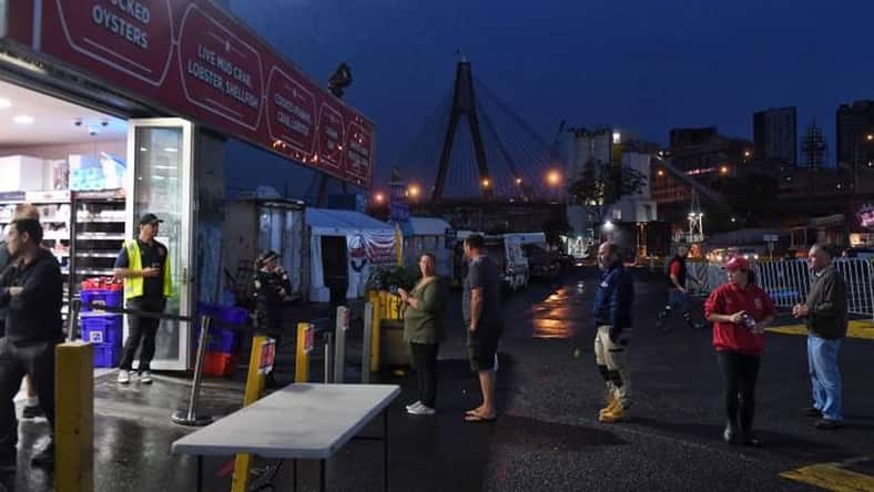 Shoppers line up at Sydney Fish Market on Good Friday 