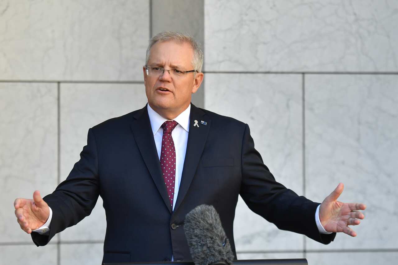 Prime Minister Scott Morrison speaks to the media at a press conference in Canberra.