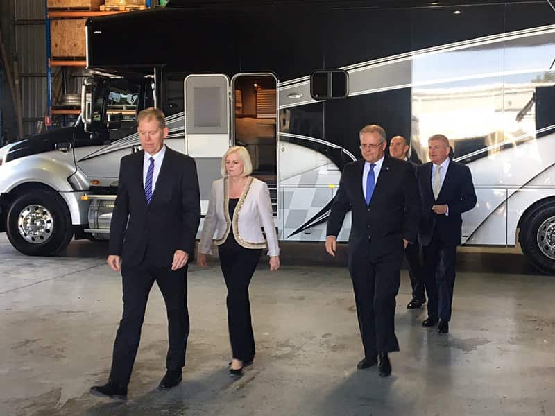 Treasurer Scott Morrison (2R) at an announcement on the Gold Coast