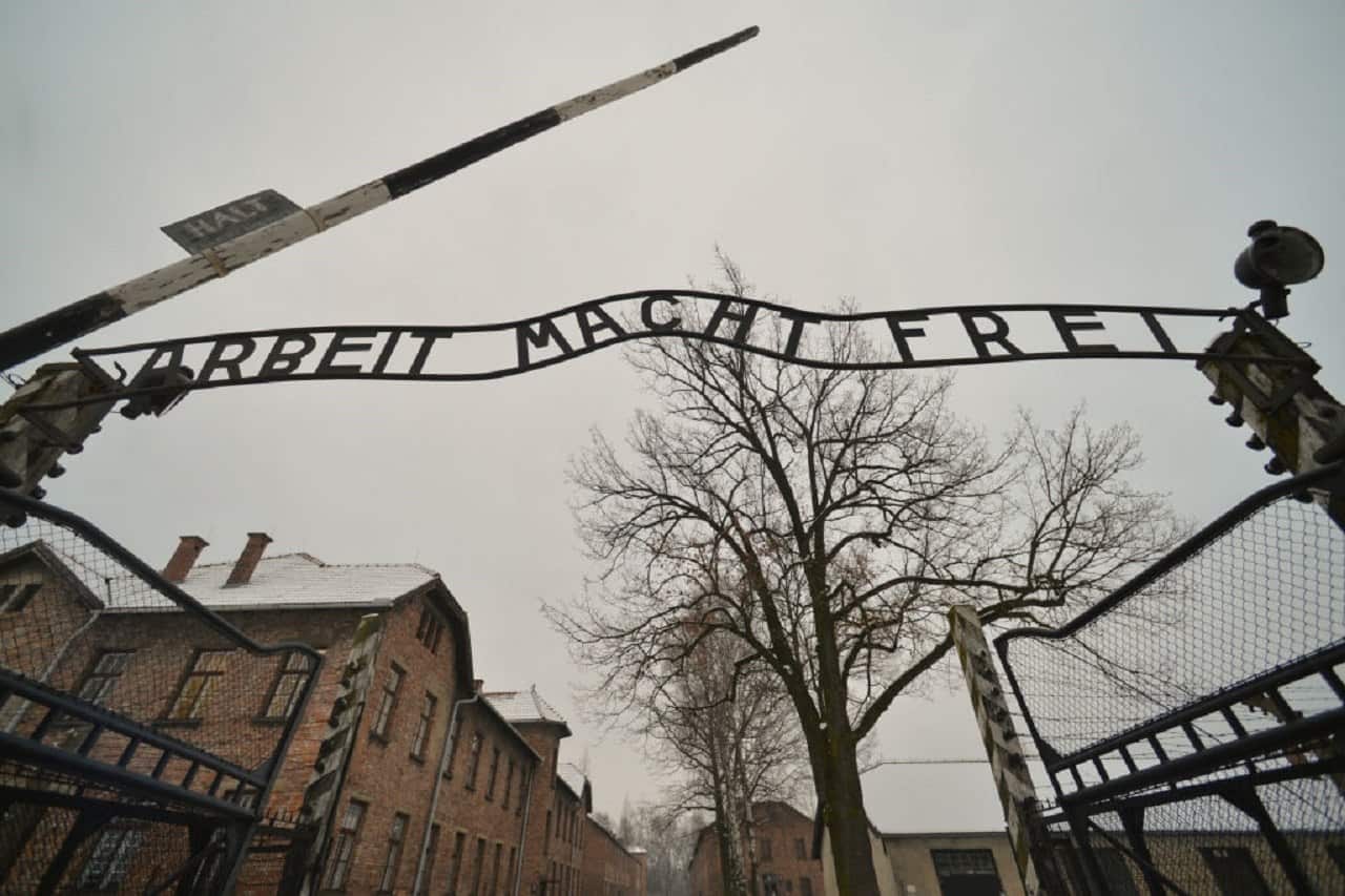 A view of Arbeit Macht Frei sign on the entrance gate to the former Auschwitz 1 camp.