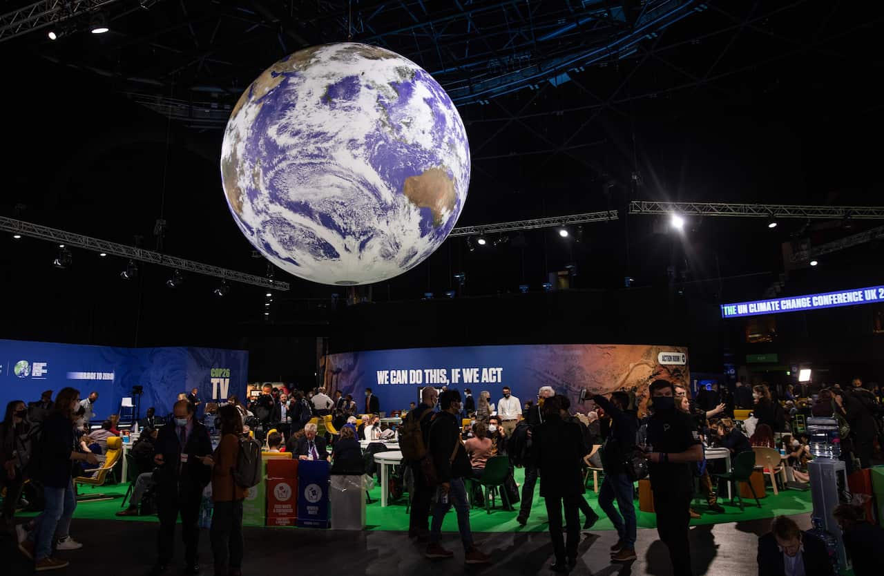Attendees in the Blue Zone during the COP26 climate talks in Glasgow, Britain, 2 November 2021.