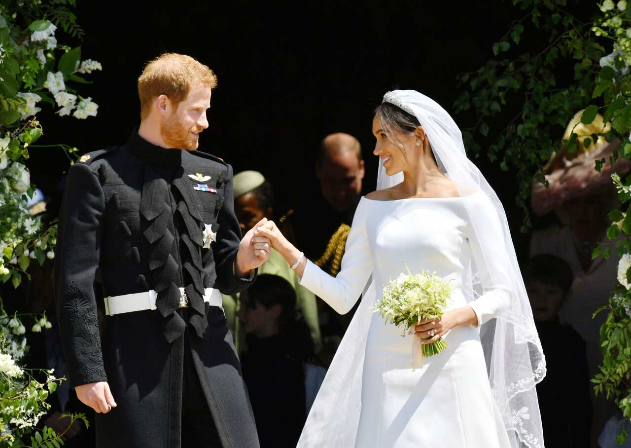 Prince Harry and Meghan Markle leave St George's Chapel in Windsor Castle after their wedding