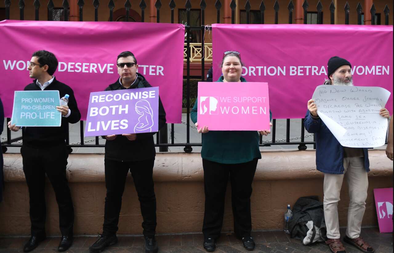 A small group of anti abortion protesters rally outside NSW State Parliament during the Reproductive Health Care Reform Bill 2019 debate.