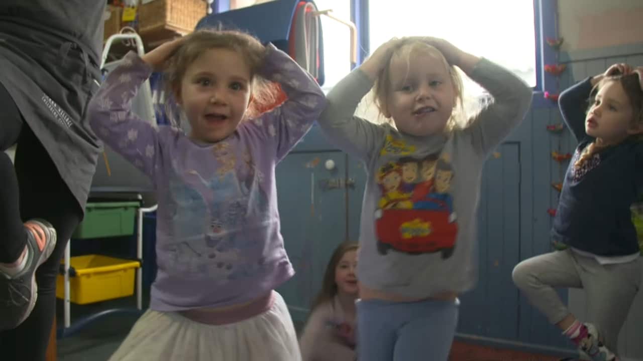 Children doing yoga.