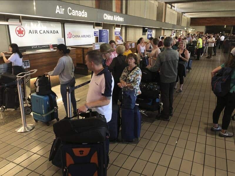 Passengers from a Sydney-bound Air Canada flight in Honolulu.