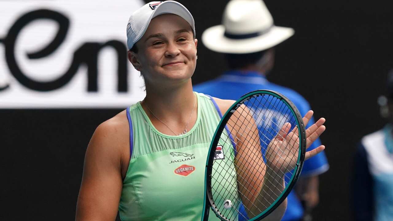 Australia's Ashleigh Barty celebrates after defeating Kazakhstan's Elena Rybakina in their third round match at the Australian Open tennis championship.