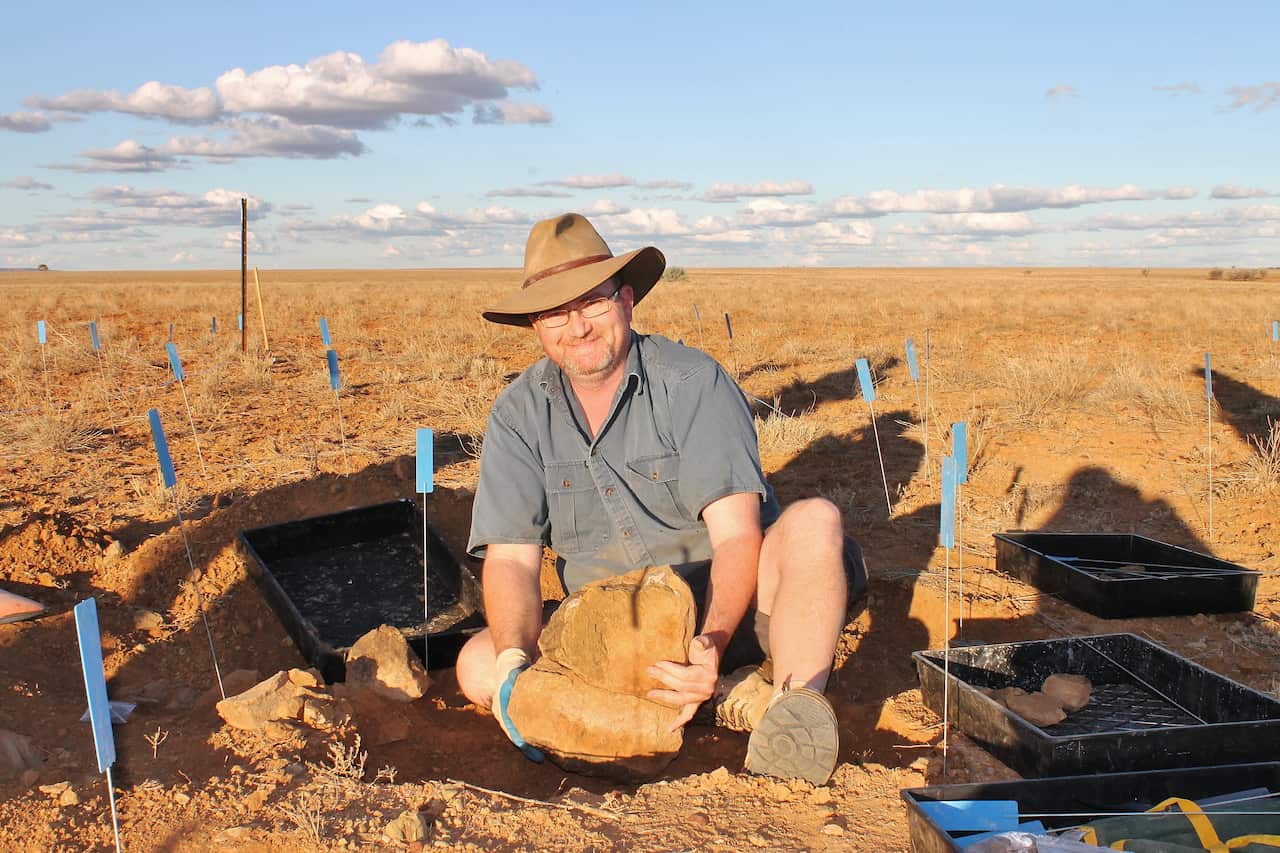 Queensland Museum palaeontologist Scott Hocknull on a dig.
