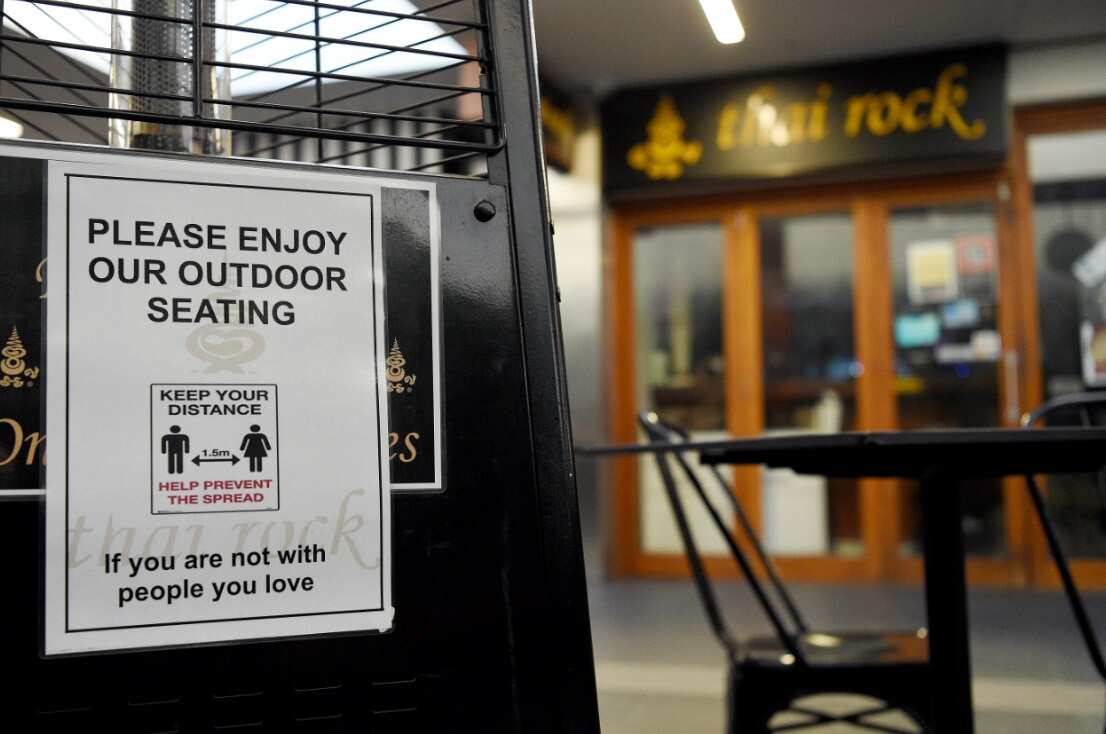 Social distancing signage is seen at the Thai Rock restaurant at Stockland Wetherill Park Shopping Centre in Sydney, Thursday, July 23, 2020