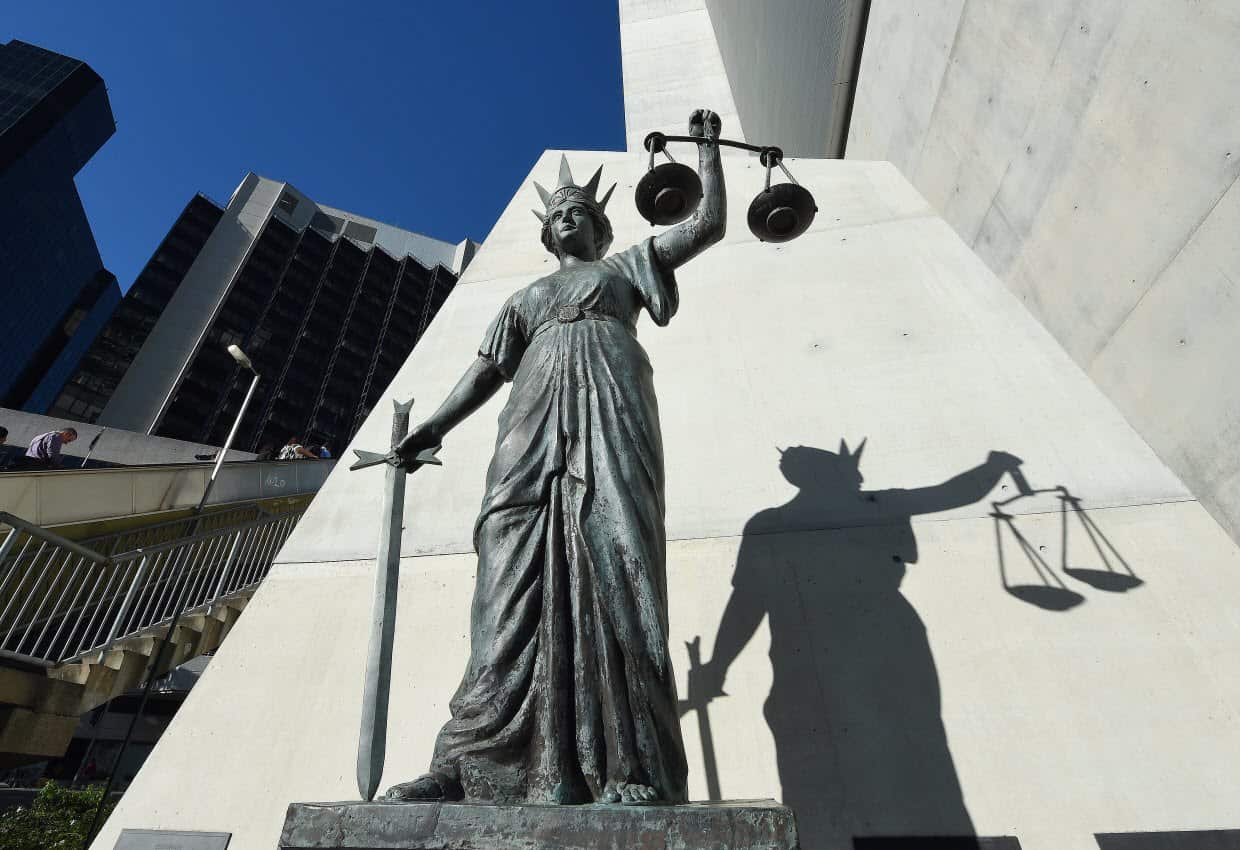 A statue of Themis, the Greek God of Justice stands outside the Supreme Court in Brisbane, Thursday, Oct. 20, 2016. 