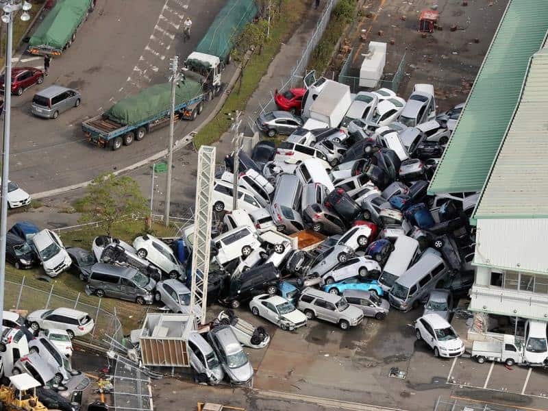 An aerial picture shows cars pilled up a day after Typhoon Jebi.
