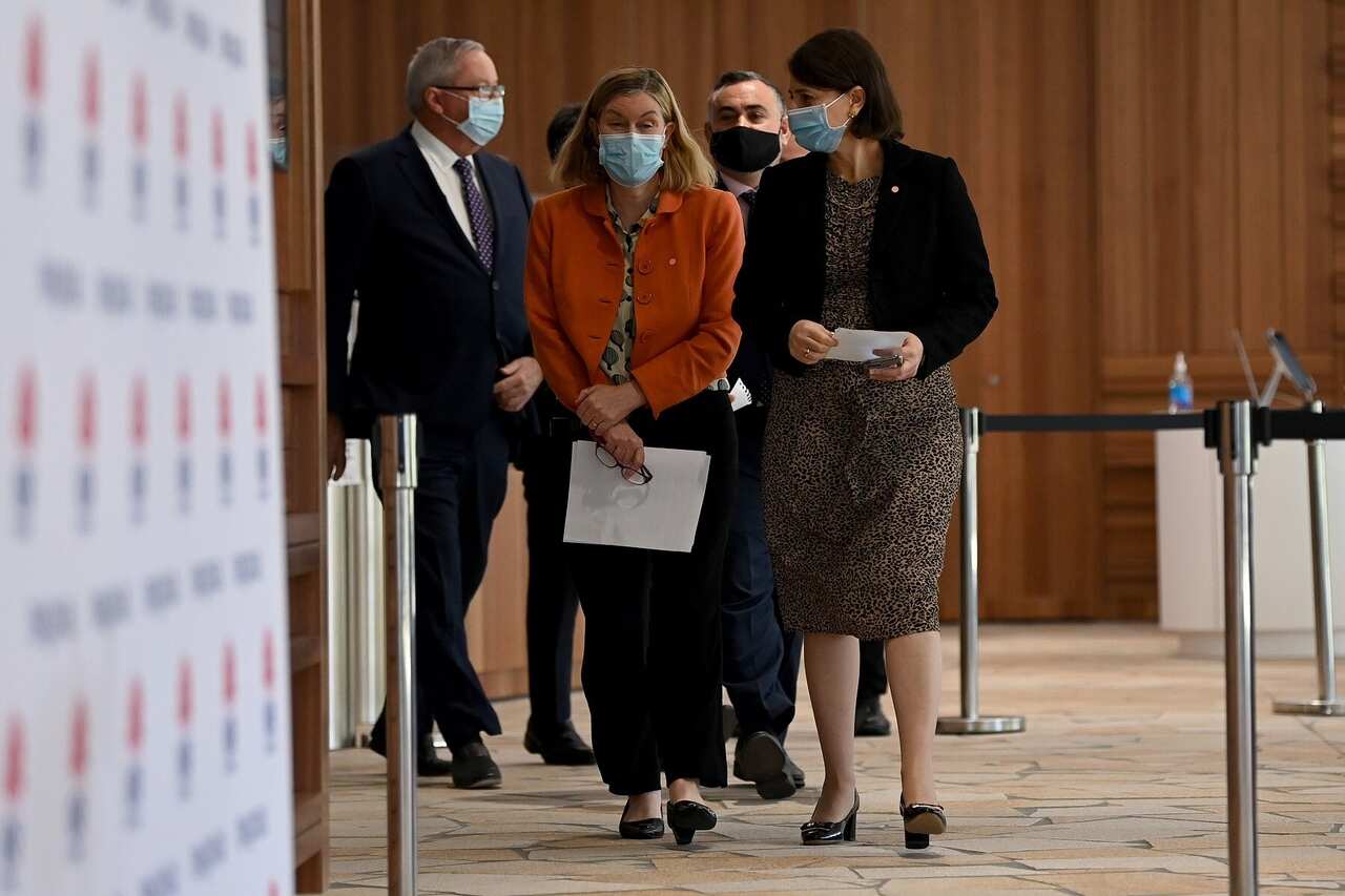 NSW Chief Health Officer Dr Kerry Chant and NSW Premier Gladys Berejiklian arrive for a COVID-19 press conference