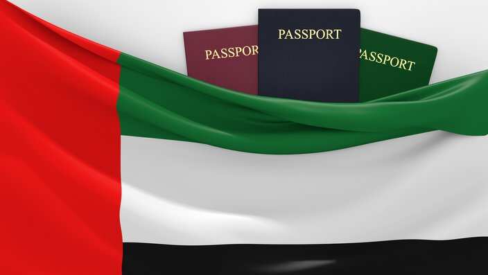 Travel and tourism in United Arab Emirates, with assorted passports