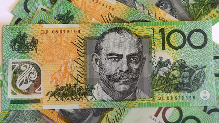 $100 Australian dollar notes, pictured in Brisbane, Tuesday, Aug. 20, 2013. (AAP Image/Dan Peled) NO ARCHIVING