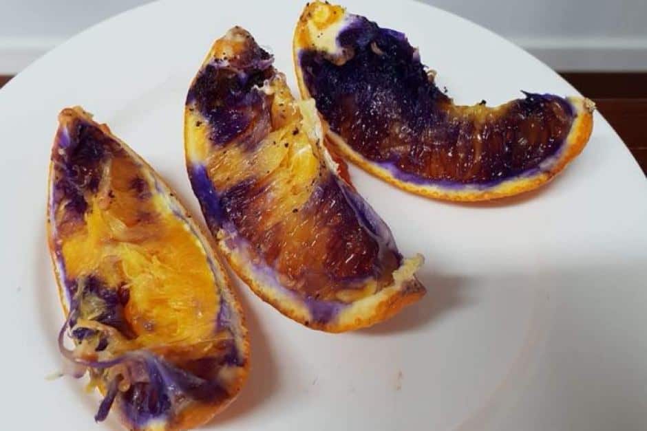 Slices of orange turning purple
