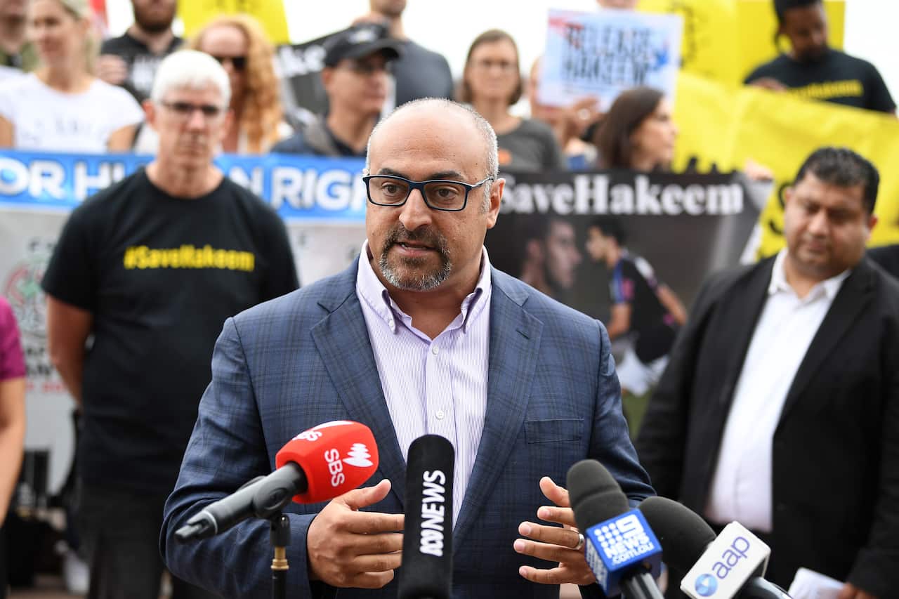 Federal member for Wills Peter Khalil speaks at a rally to demand freedom for detained Bahraini footballer Hakeem Al-Araibi in February. 