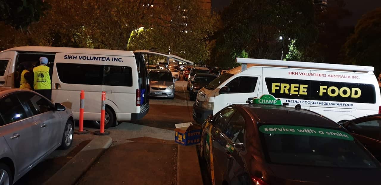Sikh volunteers food van served free meals to the residents of public housing towers near Flemington.