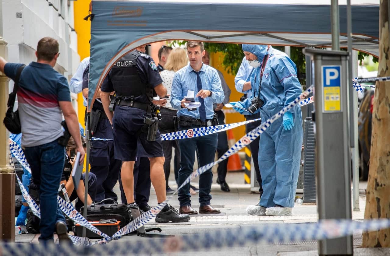 The forensic scene where police shot and killed a man outside the Westin Hotel on Mary Street in central Brisbane