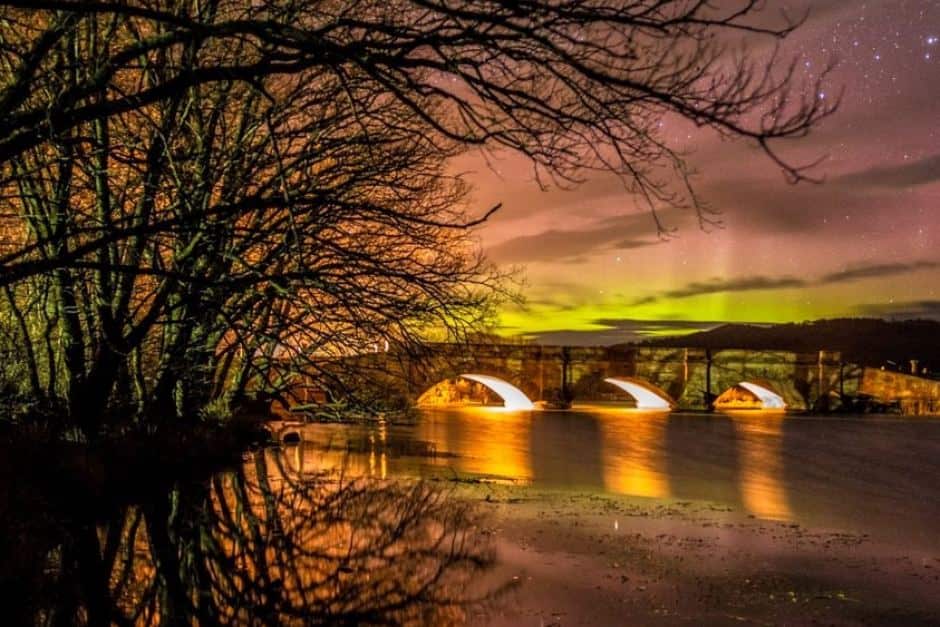 Historic Ross Bridge, Tasmania with Aurora Australis in background