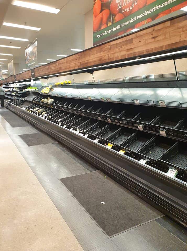 Empty vegetable and fruit shelves in a Melbourne's supermarket. 