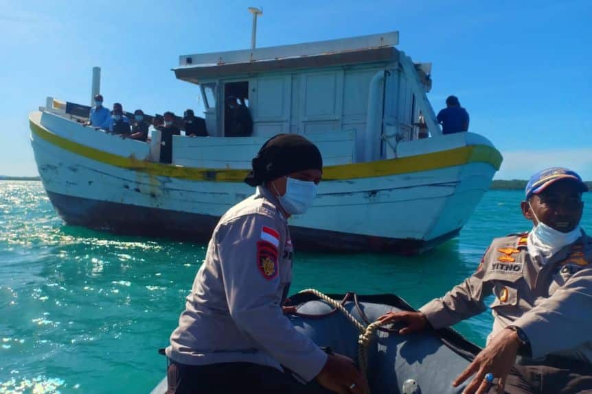 The six men and their two Indonesian crew have effectively been put into quarantine due to coronavirus concerns.