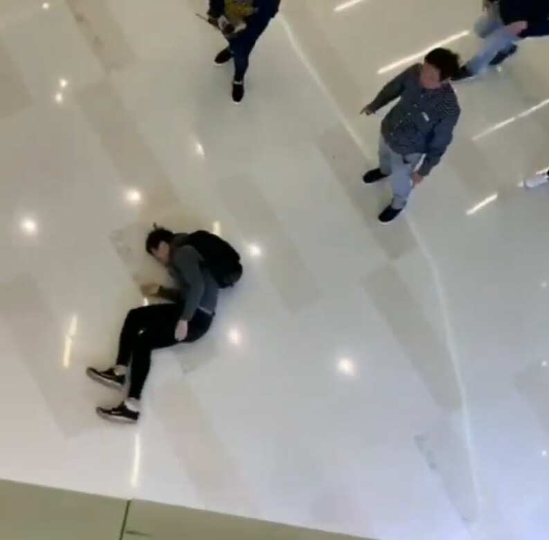 A man fell down from 2/F allegedly escaping from police's raid.