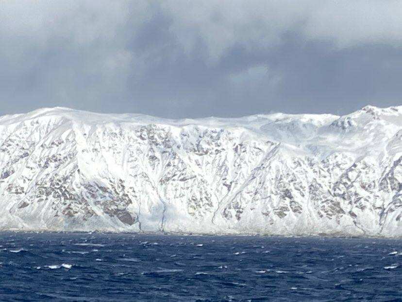 Macquarie Island is almost half way between New Zealand and Antarctica.