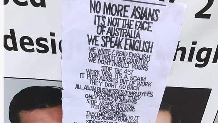 Chinese-Australian real estate billboard defaced with Anti-Asian posters in Sydney