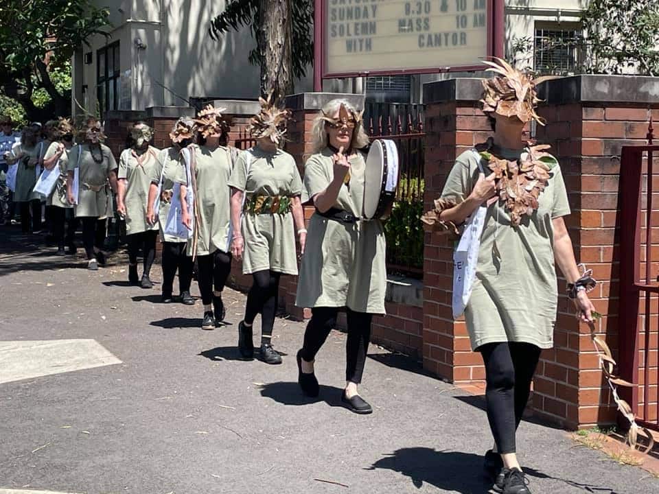 Eco-arts collective Tree Veneration Society walked down Oxford Street to attend Requiem.