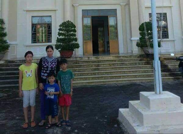 Tran Thi Lua and her three children