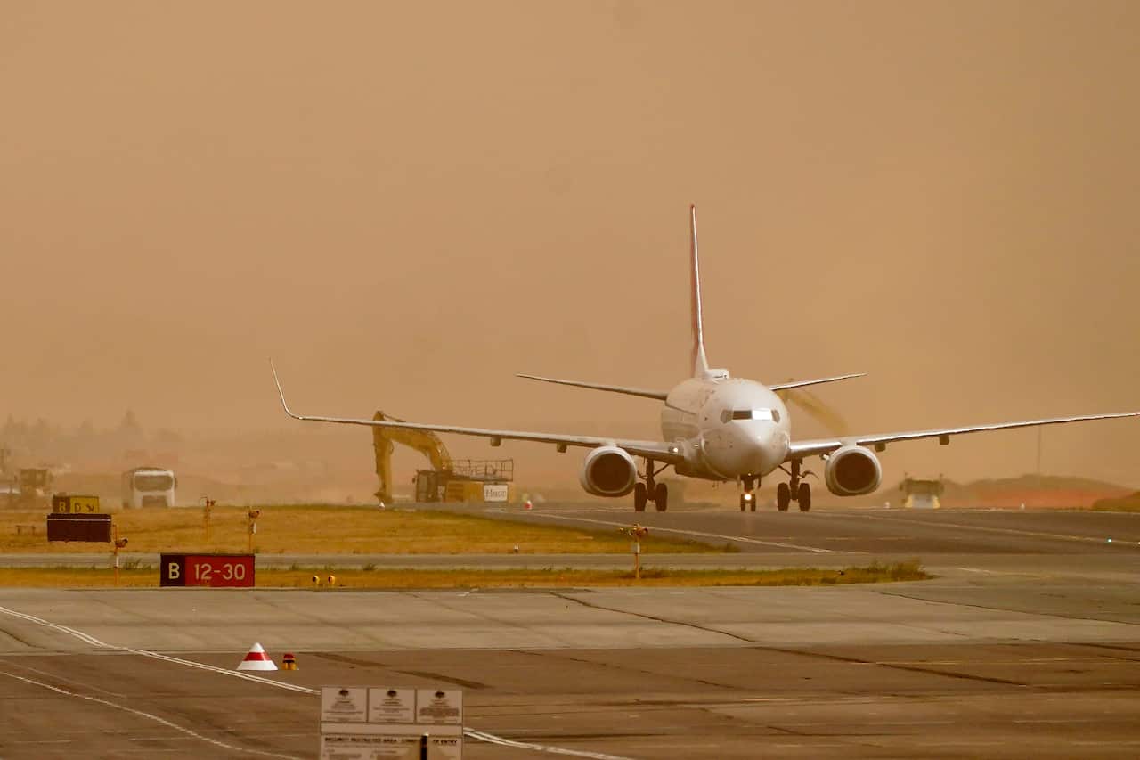 Canberra Airport closed due to emergency bushfire warning.