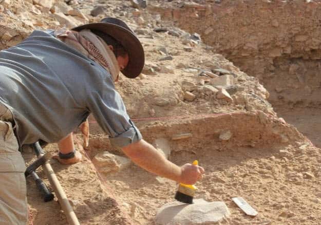 Remains of homo erectus stone tools being excavated from mounds in the Arabian Peninsula.