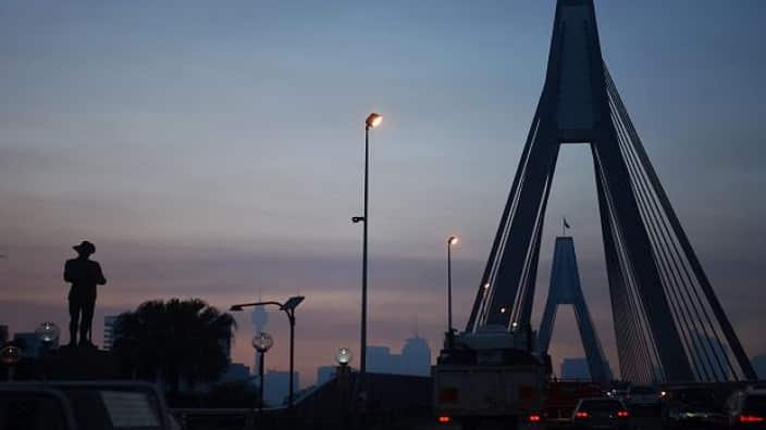 Smoke lingers over Sydney CBD after a weekend of hazard reduction burns on the Central Coast and Blue Mountains