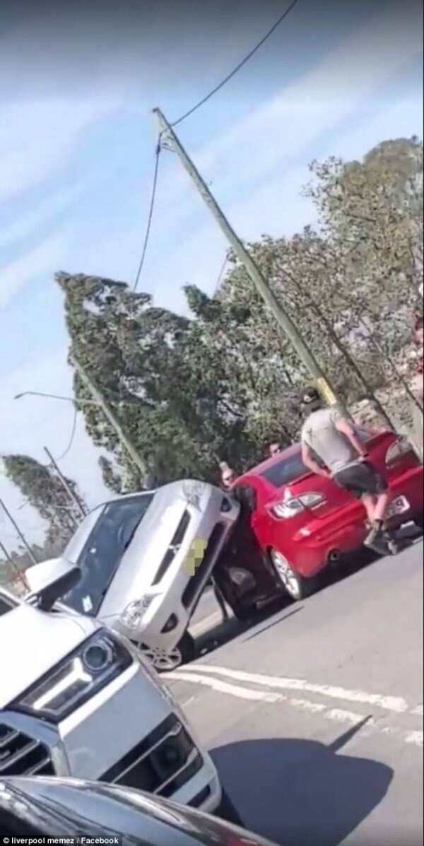 Sydney bizarre crash that left one car balancing on top of another